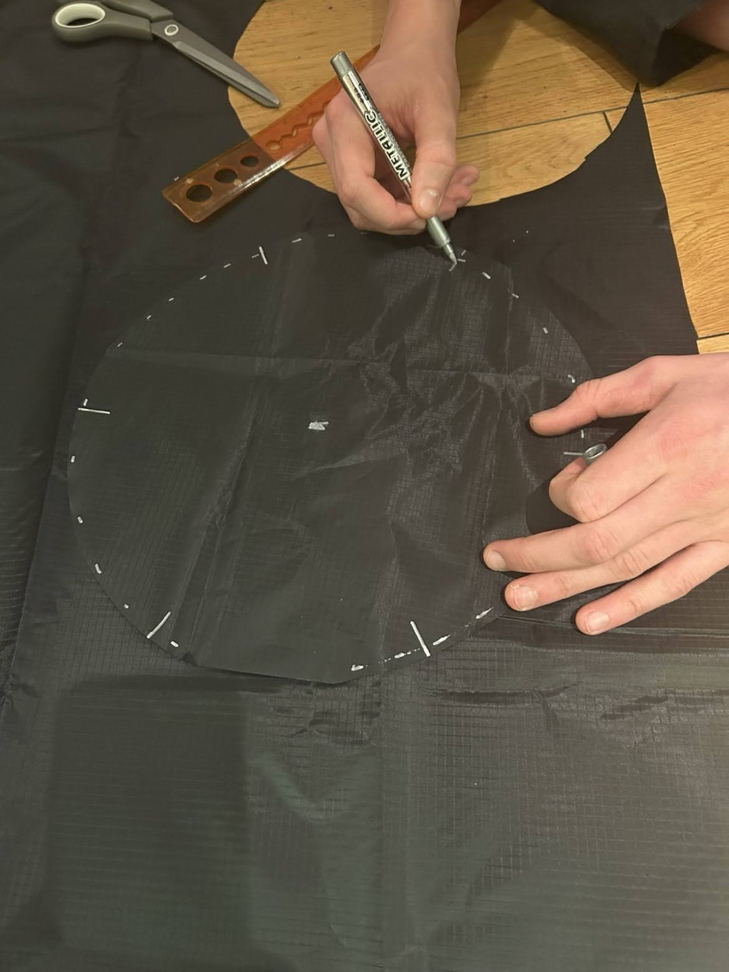 Cutting the canopy for the StratoSat recovery parachute