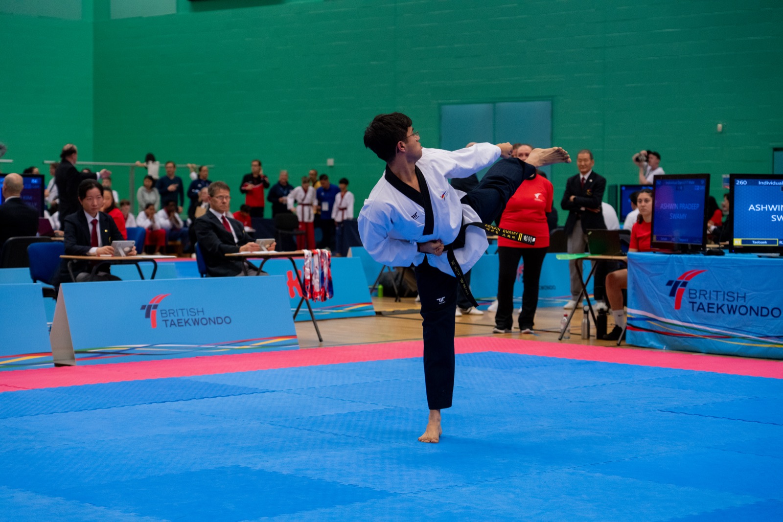 Ashwin performing a kick at the British Taekwondo Nationals